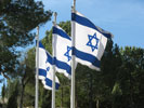 Three Israeli flags flying